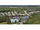 Neighborhood featuring lush landscaping, community pool, clubhouse, and tennis court at 2077 Amalfi Pl, Apex, NC 27502