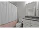 Bathroom featuring a vanity with granite countertop, tiled walls, and a shower with curtain at 2077 Amalfi Pl, Apex, NC 27502