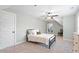 Bedroom features neutral tones, sloped ceilings, and ceiling fan at 210 Sorrel Dr, Franklinton, NC 27525