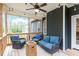 Relax on this covered porch with inviting outdoor seating and string lights at 210 Sorrel Dr, Franklinton, NC 27525