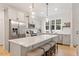 Modern kitchen with stainless steel appliances and a large center island at 210 Sorrel Dr, Franklinton, NC 27525