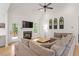 Comfortable living room with fireplace and neutral colors throughout the interior at 210 Sorrel Dr, Franklinton, NC 27525