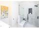 Bathroom with marble tiled walk-in shower, glass door, and a built-in seat and niche at 2106 University Dr, Durham, NC 27707