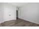 Bedroom with hardwood floors, double door closet, and neutral color scheme for a serene atmosphere at 2178 Pink Peony Circle Lot 167 Cir, Durham, NC 27703