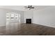 Bright and open living room featuring a fireplace and hardwood floors, perfect for entertaining at 2178 Pink Peony Circle Lot 167 Cir, Durham, NC 27703