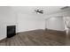 Spacious living room featuring a cozy fireplace, neutral color scheme, and hardwood flooring at 2178 Pink Peony Circle Lot 167 Cir, Durham, NC 27703