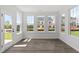 Sunroom featuring abundant light, hardwood floors and backyard views at 2178 Pink Peony Circle Lot 167 Cir, Durham, NC 27703