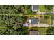 Aerial view highlighting the property and its surrounding landscape at 225 Sacred Fire Rd, Louisburg, NC 27549