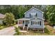 Inviting two-story home with well-maintained landscaping and great curb appeal at 225 Sacred Fire Rd, Louisburg, NC 27549