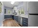 Stylish kitchen boasts stainless appliances, attractive countertops, and well-designed cabinets, offering both beauty and utility at 225 Sacred Fire Rd, Louisburg, NC 27549