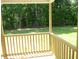 View from the home's covered back porch and lush green yard at 235 Eason Creek Way, Clayton, NC 27527