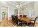 Dining room featuring hardwood floors, chandelier, recessed lighting, and seating for six at 238 Michelangelo Way, Cary, NC 27518