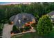 Gorgeous home with lush landscaping, warm exterior lighting and impeccable curb appeal at 238 Michelangelo Way, Cary, NC 27518