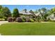 Lovely front yard with mature landscaping and a well-manicured lawn at 238 Michelangelo Way, Cary, NC 27518