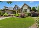 Lovely home with attractive facade, stone accents and manicured landscaping at 238 Michelangelo Way, Cary, NC 27518