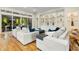 Spacious living room with hardwood floors, generous seating, and seamless access to the beautiful outdoor views at 238 Michelangelo Way, Cary, NC 27518