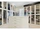 Spacious walk-in closet with custom shelving and ample storage space at 238 Michelangelo Way, Cary, NC 27518