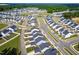 New home community featuring modern homes, a central roundabout, and a well-planned layout at 279 Edge Of Auburn Blvd, Raleigh, NC 27610