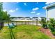 Spacious, well-maintained backyard with green grass and a view of neighboring houses at 279 Edge Of Auburn Blvd, Raleigh, NC 27610