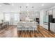 Modern eat-in kitchen with white cabinets, stainless steel appliances, and island with seating at 279 Edge Of Auburn Blvd, Raleigh, NC 27610