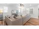 Comfortable living room with a large sectional sofa, fireplace and television providing a cozy space to relax at 279 Edge Of Auburn Blvd, Raleigh, NC 27610
