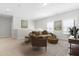 Upstairs loft area with plenty of room, natural light, and comfortable seating at 279 Edge Of Auburn Blvd, Raleigh, NC 27610