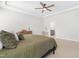 Large bedroom features a tray ceiling, ceiling fan, and and vanities in the adjacent bathroom at 279 Edge Of Auburn Blvd, Raleigh, NC 27610