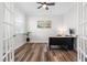 Bright office with hardwood floors, french doors, windows, and functional desk at 279 Edge Of Auburn Blvd, Raleigh, NC 27610