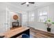 Bright office with hardwood floors, french doors, windows, and modern desk space at 279 Edge Of Auburn Blvd, Raleigh, NC 27610