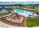 Aerial shot featuring a community pool, playground, and lounge area at 279 Edge Of Auburn Blvd, Raleigh, NC 27610
