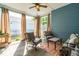 Cozy screened porch with comfortable seating, ideal for relaxation and enjoying the outdoors at 279 Edge Of Auburn Blvd, Raleigh, NC 27610