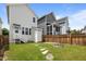 Backyard with stepping stones leading to door of home at 282 Granite Mill Blvd, Chapel Hill, NC 27516