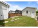 Backyard with grass, stepping stones and privacy fence at 282 Granite Mill Blvd, Chapel Hill, NC 27516