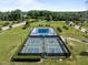 Aerial view of outdoor basketball and pickleball courts surrounded by a well-maintained green space at 282 Granite Mill Blvd, Chapel Hill, NC 27516