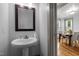 Bathroom with updated fixtures and a view into the dining area at 282 Granite Mill Blvd, Chapel Hill, NC 27516