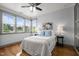 Cozy bedroom with natural light, hardwood floors, and neutral decor at 282 Granite Mill Blvd, Chapel Hill, NC 27516