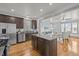 Modern kitchen features stainless steel appliances, granite countertops, and an open-concept layout at 282 Granite Mill Blvd, Chapel Hill, NC 27516