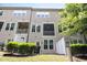 Backyard view of townhome with private balcony and patio at 3109 Stockdale Dr, Raleigh, NC 27609