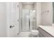 Beautiful bathroom featuring glass shower doors, subway tile shower, and sleek vanity at 3109 Stockdale Dr, Raleigh, NC 27609