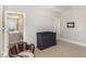 Brightly lit Bedroom with gray and blue color scheme and a baseball glove chair creating a cozy space at 3109 Stockdale Dr, Raleigh, NC 27609
