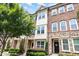 A charming brick and stone townhome with well-maintained landscaping at 3109 Stockdale Dr, Raleigh, NC 27609
