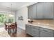 Kitchen and eat-in area with granite countertops and stainless steel appliances at 3109 Stockdale Dr, Raleigh, NC 27609