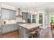 Beautiful kitchen featuring an island, pendant lighting, and stainless steel appliances at 3109 Stockdale Dr, Raleigh, NC 27609