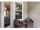 Relaxing outdoor seating area with two wicker chairs and a table at 3109 Stockdale Dr, Raleigh, NC 27609