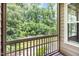 Screened-in porch with a view of mature trees at 3109 Stockdale Dr, Raleigh, NC 27609