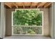 View from a balcony of lush surrounding greenery and trees at 313 Glen Echo Ln # J, Cary, NC 27518