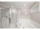 Bathroom featuring a jacuzzi tub and shower with grab bars for accessibility at 313 Glen Echo Ln # J, Cary, NC 27518