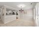 Bright dining room features large windows, modern lighting and easy access to the kitchen through the pass-through window at 313 Glen Echo Ln # J, Cary, NC 27518