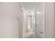 Bright hallway featuring carpet and neutral paint at 313 Glen Echo Ln # J, Cary, NC 27518
