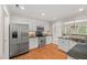 Bright, updated kitchen featuring stainless steel appliances and an open layout at 313 Glen Echo Ln # J, Cary, NC 27518